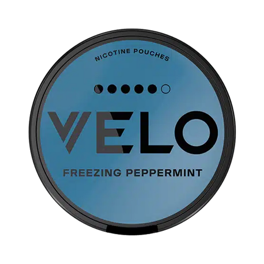 Blue container of VELO nicotine pouches with 'Freezing Peppermint' flavor on a white background